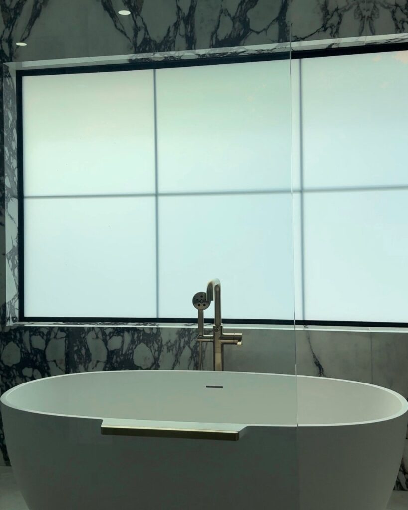 Commercial conference room glass demonstrating clear and private Smart Film states